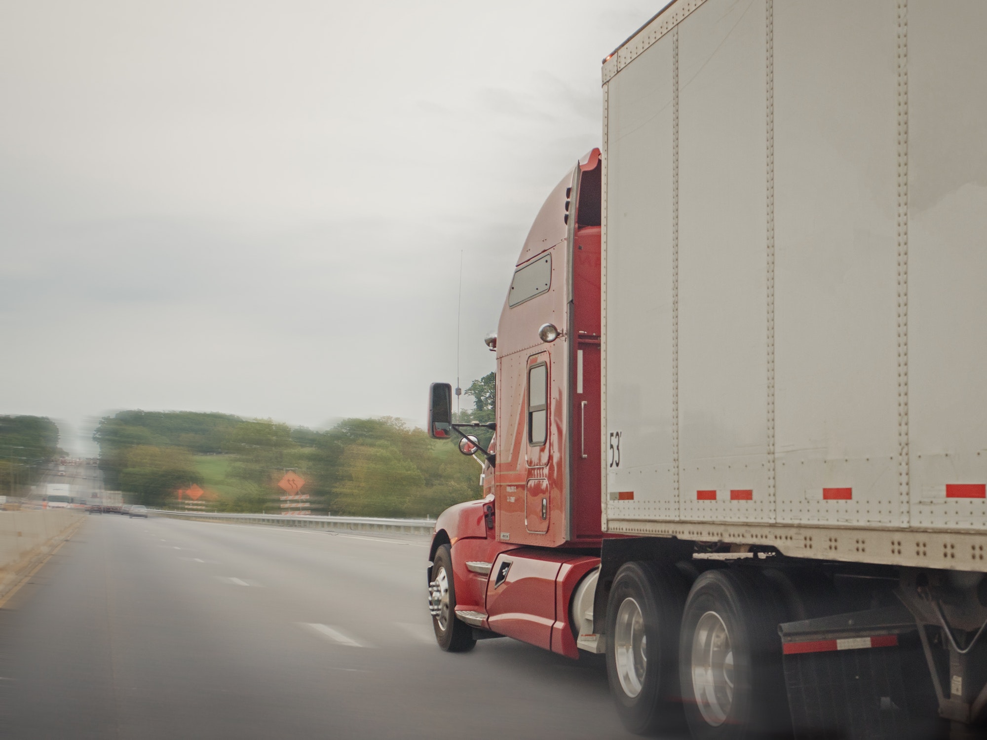 Semi-tractor 18 wheeler on the highway transport